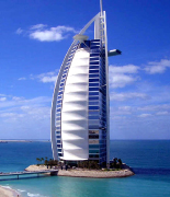 The Burj Al Arab is a Dubai (United Arab Emirates) luxury hotel, it is the fourth tallest hotel in the world with 321 m. The Burj Al Arab hotel stands on an artificial island 280 m from Jumeirah beach and is connected to the mainland by a private curving bridge. The structure's shape has been designed as sail of a ship. It's called also the world's only seven Star hotel, one of the symbols of high technology Dubai and United Arab Emirates business to business development